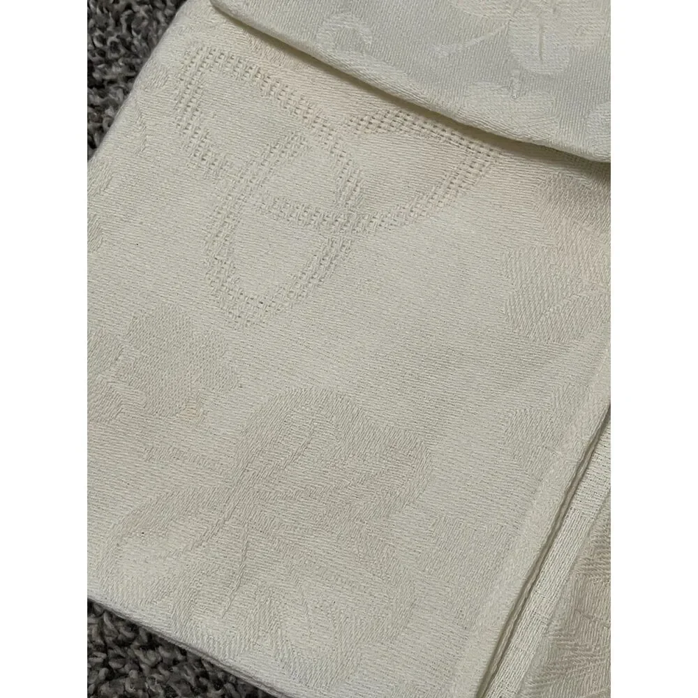 4 ivory damask dinner napkins with subtle leaf pattern